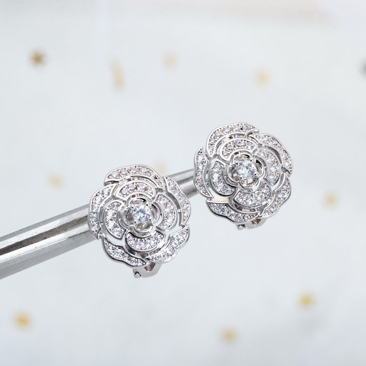 Blossoming Camellia Earrings in Silver with Zircon Embellishments