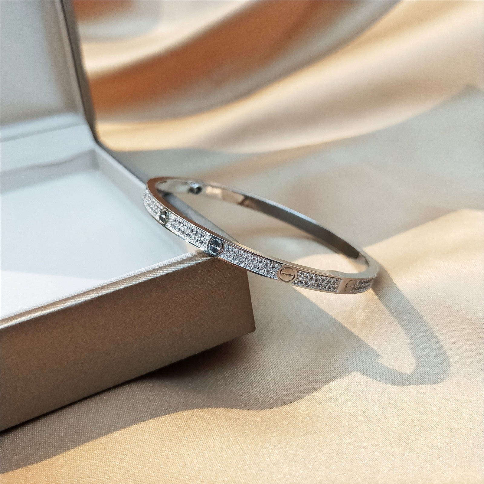 Eternal Embrace Silver Plated Bangle with Cubic Zirconia Accent