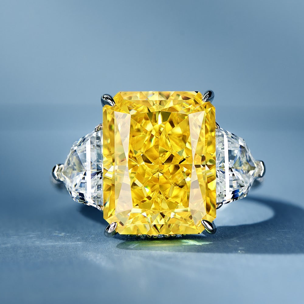 Golden Majesty: 11 Carat Center Stone with 2 Carat Side Stones Gold-Plated Silver Ring