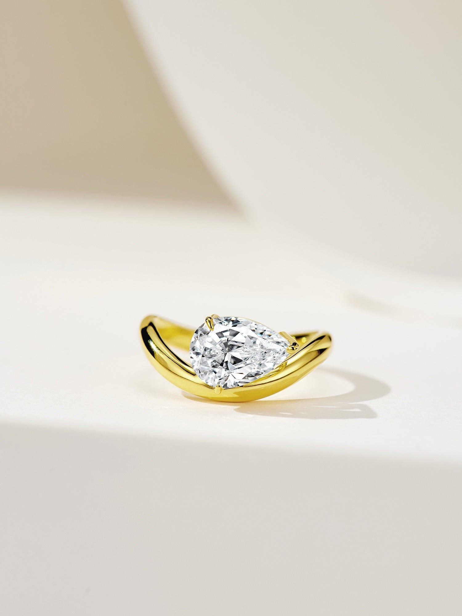 Elegant Contours: Pear-Shaped Natural Zircon Set in Gold-Plated Silver Rings