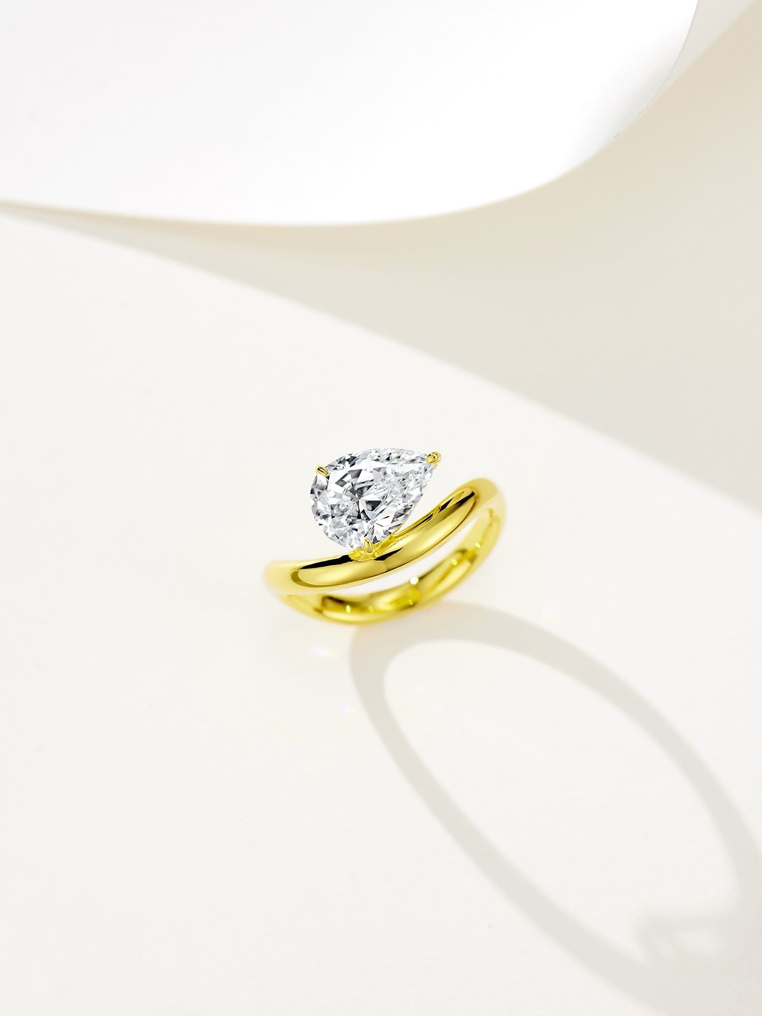 Elegant Contours: Pear-Shaped Natural Zircon Set in Gold-Plated Silver Rings