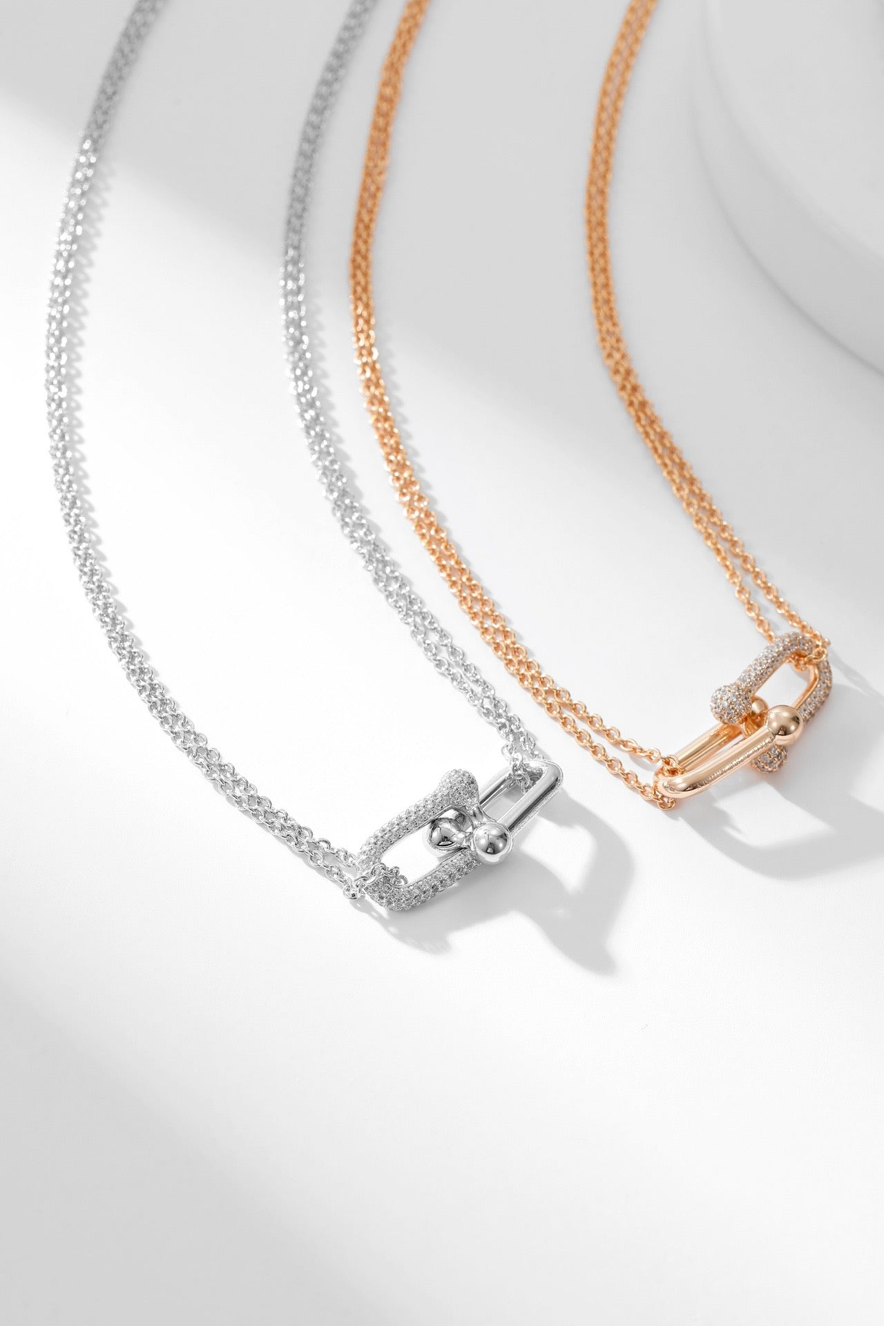 Icy Elegance: Zircon-Embellished Buckle Pendant Necklaces in Silver and Rose Gold Plating