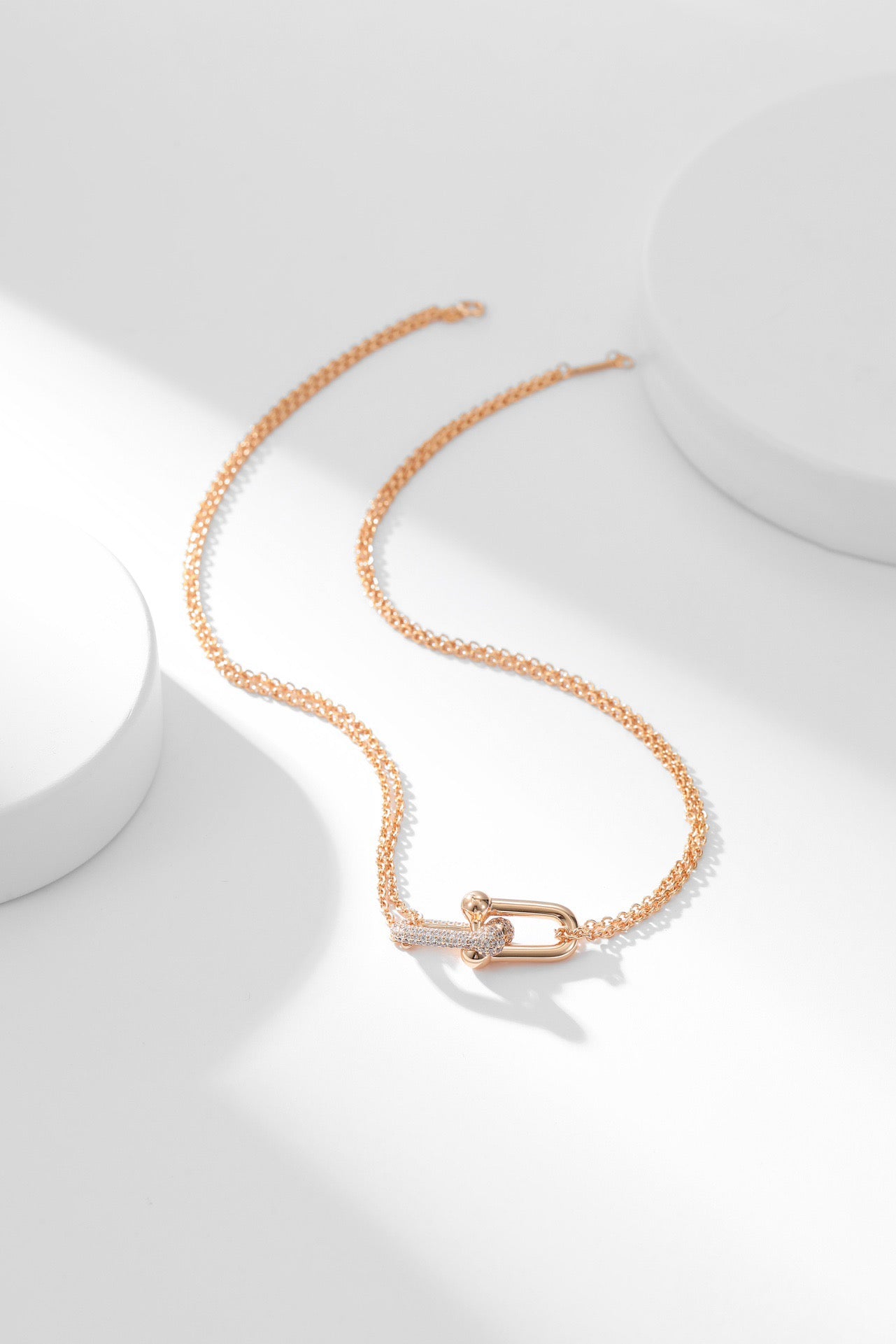 Icy Elegance: Zircon-Embellished Buckle Pendant Necklaces in Silver and Rose Gold Plating