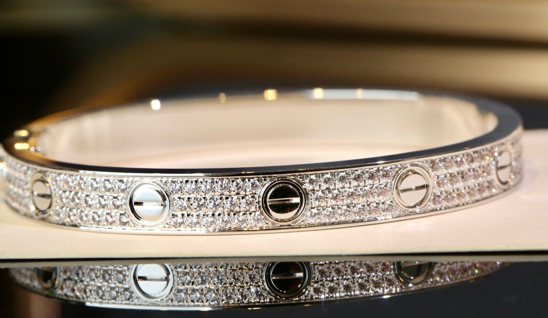 Gleaming Harmony: Zircon-Encrusted Gold-Plated Silver Bangles