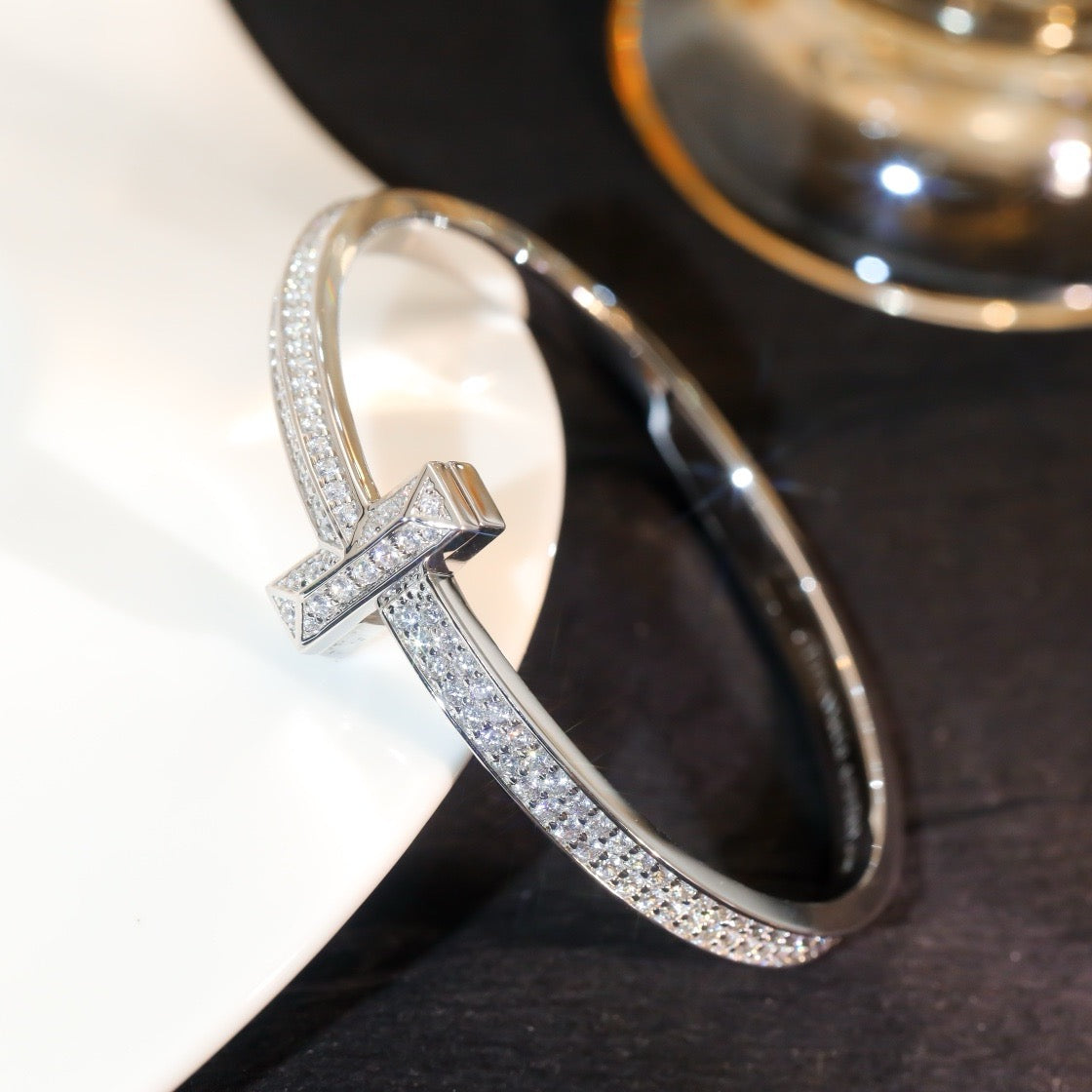 Cross of Light: Zircon-Encrusted Silver Bangle