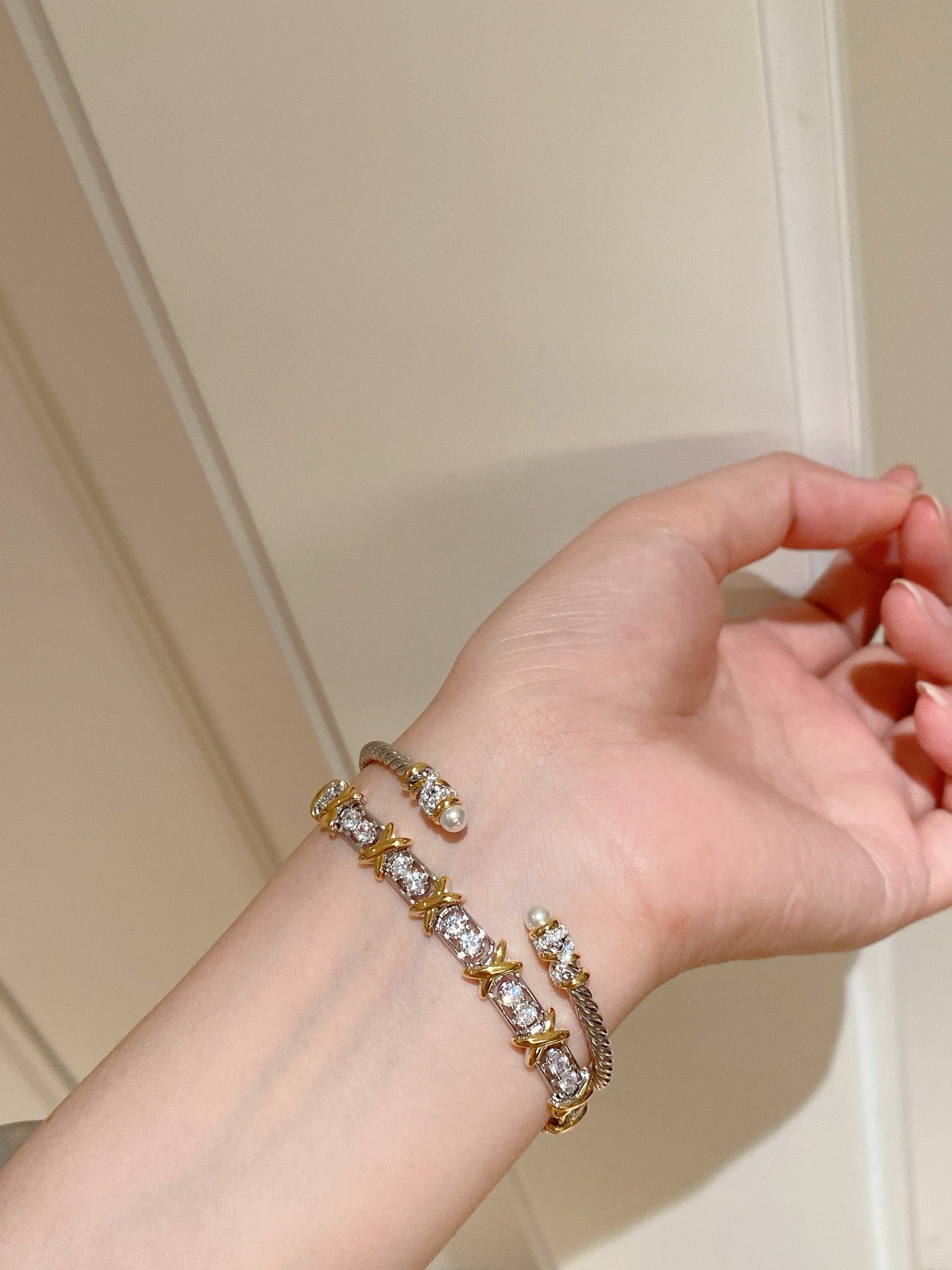 Elegant Silver Bracelet with Gold Plating, Swarovski Pearls, and Zirconia